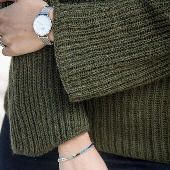 1671 – Patent strikket genser i Mayflower Easy Care
3