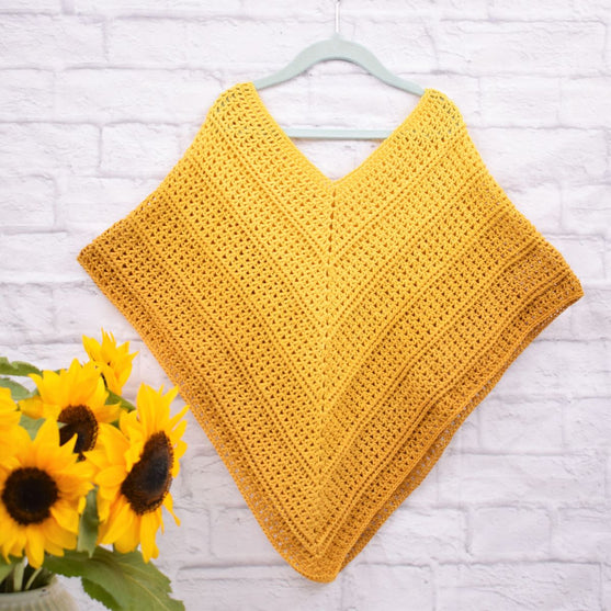 

Timeless Barne Poncho - Sultan
3