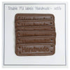 

PU skinn merke med teksten "Handmade" 5 x 1,5 cm - Go Handmade
1