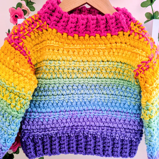 

Cosy Rainbow Jumper - Barnegenser
3