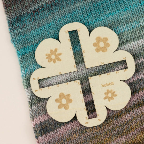 

Strikkefasthetsmåler - Blomst - Hobbii
4