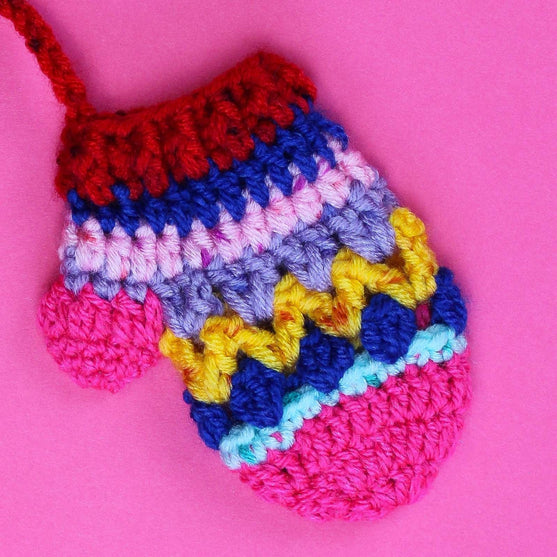 

Mini Mitten - Serviettbånd
3