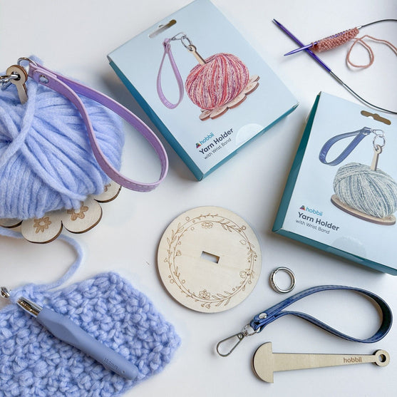 

Håndledds Garnholder - Hobbii
4